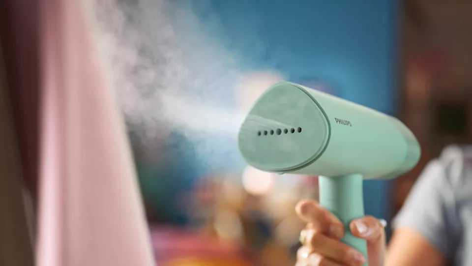 Philips STH3010/70 Handheld Garment Steamer 1000W | Foldable | 20g/min Continuous Steam | 100ml Detachable Water Tank | Compact & Travel-Friendly | Light Green